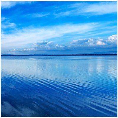 Wallario Non-Woven Photo Wallpaper, Blue Sea Cove in Italy with Water Reflection, 200 x 140 cm