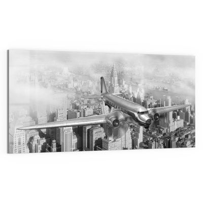 DEQORI Glass Wall Art, Airplane Over City, Horizontal, One-Piece, 100 x 50 cm