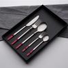 ESSONIO 40-Piece Stainless Steel Flatware Set for 8, Red Handles view 1