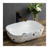 GLigeT Small Countertop Bathroom Sink with Black Faucet view 1