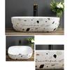 GLigeT Small Countertop Bathroom Sink with Black Faucet view 3