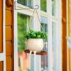 Hanging Resin Face Planter with Swiveling Face view 1