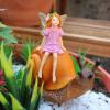 Sitting Fairy on Snail Garden Statue view 4