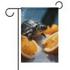Vertical Double-Sided Winter Garden Flag with Turtles Emerging from Oranges view 1