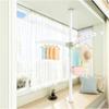 Adjustable Floor-to-Ceiling Garment Rack with 2 Tiers for Indoor Use view 1