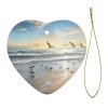 The Beach with Seabirds Heart-Shaped Double-Sided Ceramic Christmas Ornament with Gold Ribbon view 2