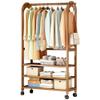 Wooden Garment Rack with 3-Tier Shelves and 4 Casters view 1