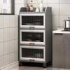 Rolling Microwave Stand, Freestanding Kitchen Cabinet and Wooden Baker’s Rack with Folding Doors view 1