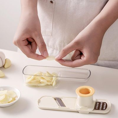 Garlic Slicer with Ergonomic Handle and Integrated Container (White)