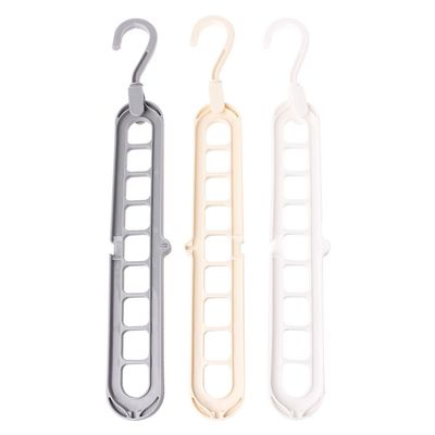 HELYZQ Space-Saving Clothes Rack with Hooks, 360° Rotatable